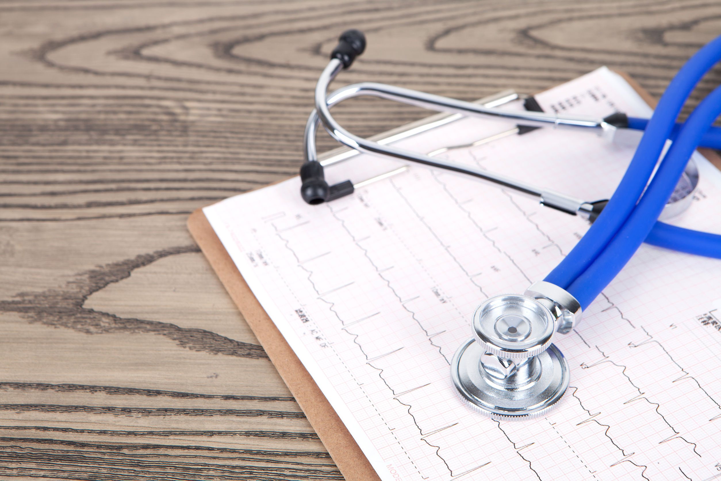 a stethoscope and clip board